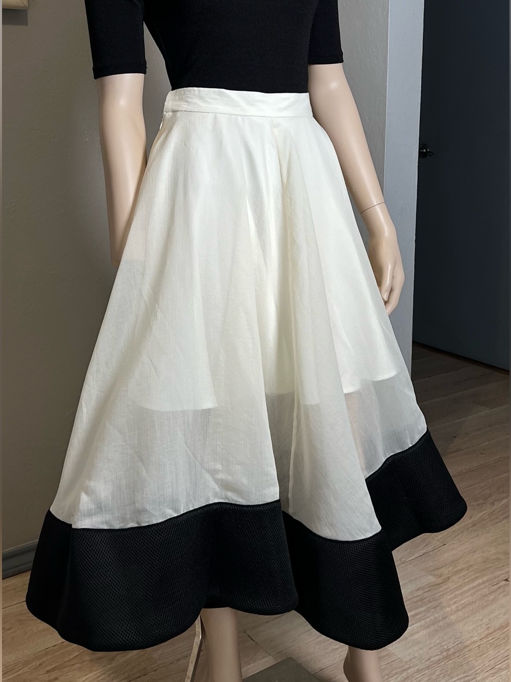 Classic Ivory A-Line Skirt with Wide Black Hem